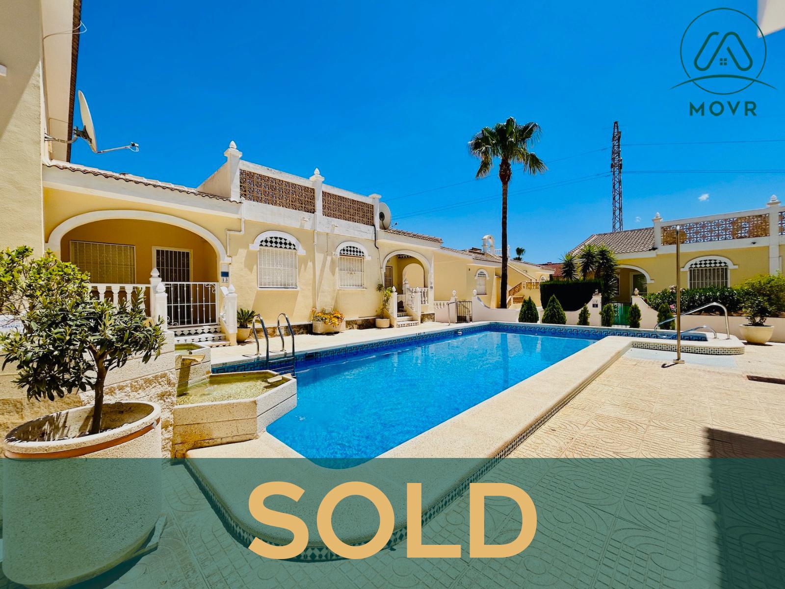 Single-storey bungalows around a large communal pool previously sold by MOVR in Orihuela Costa