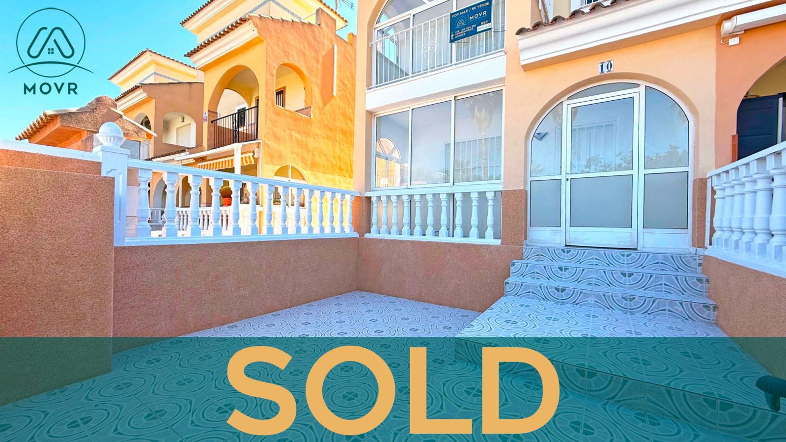 Ground-floor apartment with a private tiled patio previously sold by MOVR in Orihuela Costa